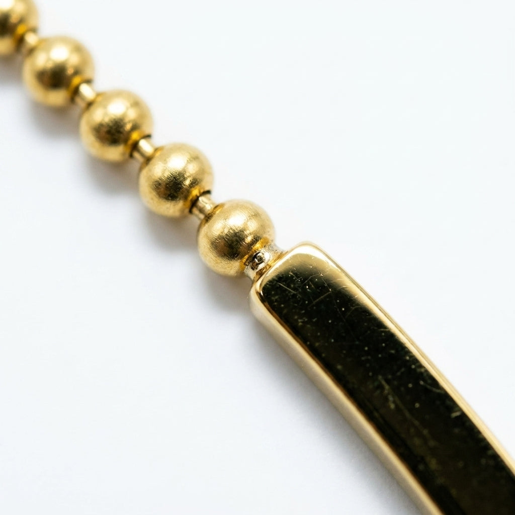 สร้อยข้อมือสแตนเลสแท้ ลายไข่ปลาประดับบาร์เงาสไตล์มินิมอล (Minimalist Gold Ball Chain Curved Bar Bracelet)
