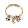 กำไลข้อมือสแตนเลสแท้ 316L สีทอง ดีไซน์ชาร์มดวงตาปีศาจ (Evil Eye) และพระจันทร์เสี้ยวนำโชค ไม่ลอกไม่ดำ [The Celestial Guardian Bangle]
